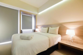 Fully Furnished Studio No Kitchen Apartment at Mustika Golf Residence By Travelio